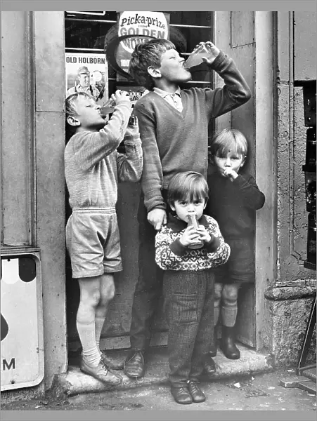 Boys outside a sweet shop, Balham, SW London