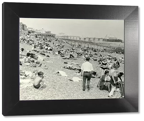 People on the beach, Eastbourne, Sussex