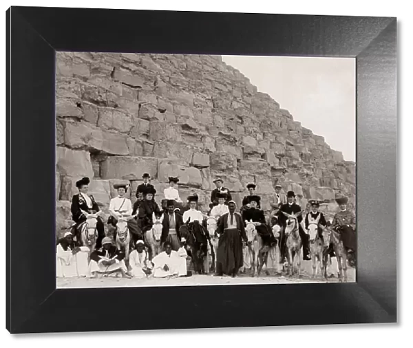Pyramids at Giza, Egypt, circa 1900 - Tourist group on donke
