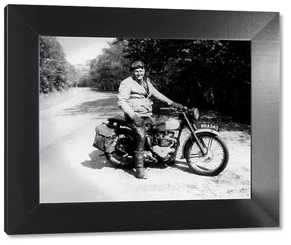 Man & 1948 Triumph motorcycle
