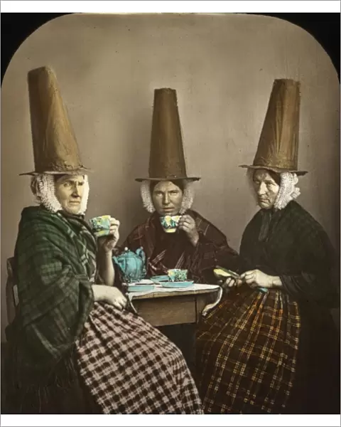 Group of three Welsh women in traditional costume