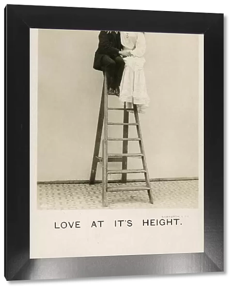 Love at its Height - a couple embrace at top of stepladder