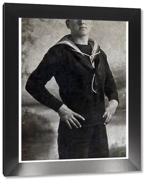 Studio photo, sailor in HMS Orion cap and uniform, WW1