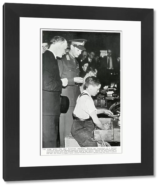 WW2 - Home Front - King George VI meets a young boy munition worker (15 year-old Leonard