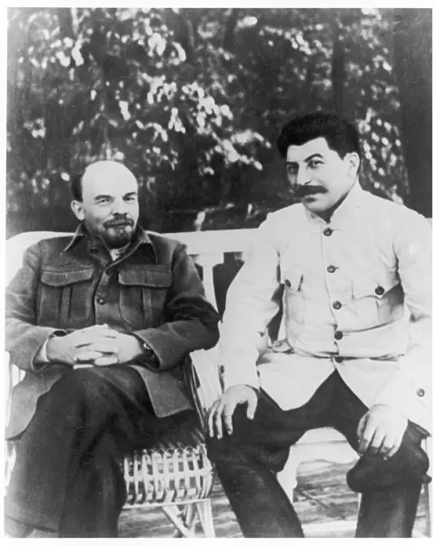 Lenin and Stalin sitting on a bench