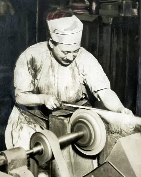 Expert grinder at Wilkinson Sword Works, WW1