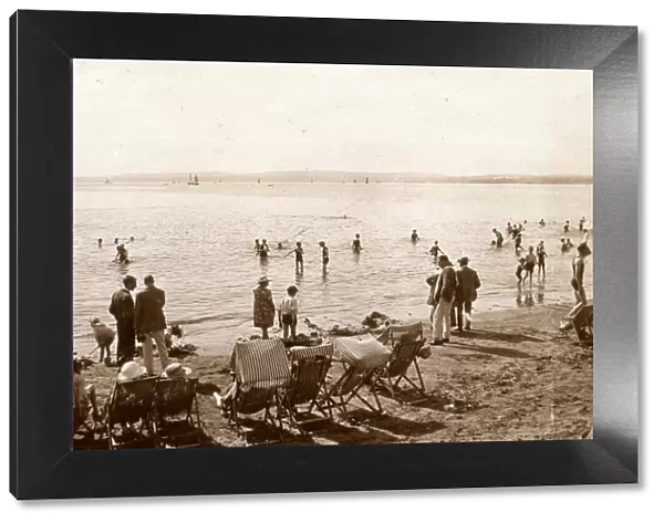 Holidaymakers on the beach at Torquay, Devon