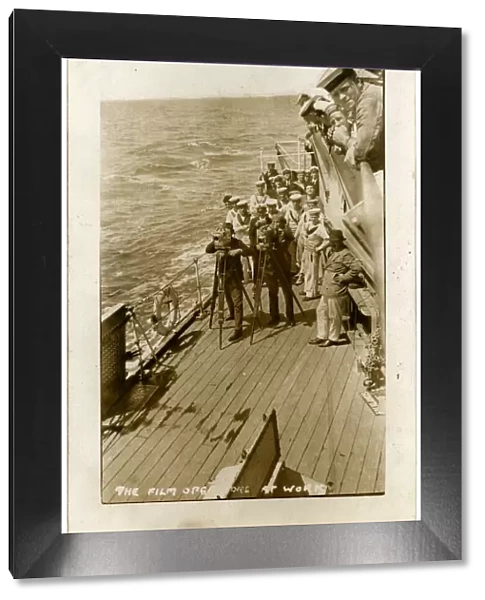 HMS Cardiff, British cruiser, with film crew at work on deck