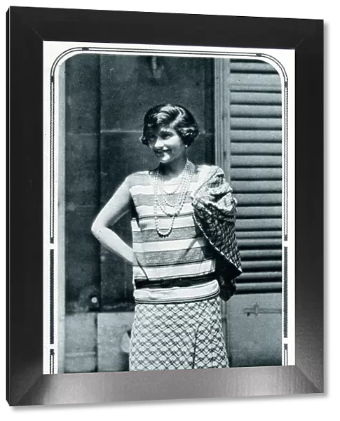 Coco Chanel in her own designs