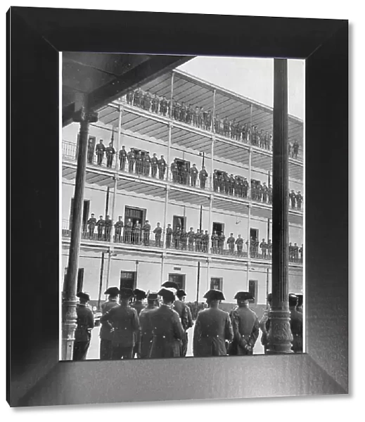 A Civil Guard Parade on a tiered building at their barracks, Spain, 1936. This was deemed a necessary alternative to drilling on the middle of the parade ground, under the burning sun of a summer's day