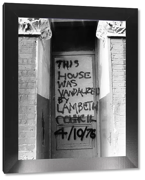 Graffitti on front door, Lambeth, South London