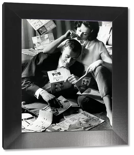 Shoot for Woman's Own - Couple looking through magazines
