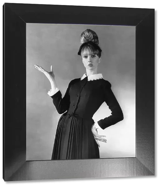 Model Pattie Boyd - Black dress with white collar