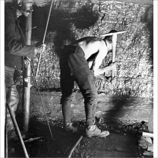 Miner working at the coalface, South Wales