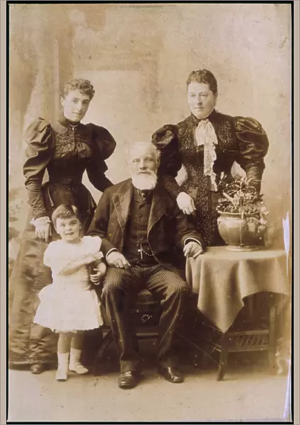 Family group photograph with four generations