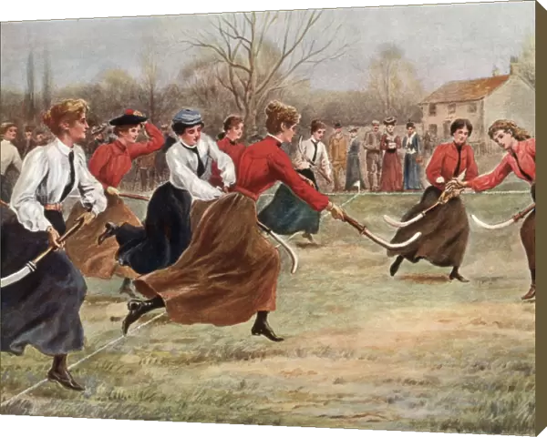 Women playing hockey