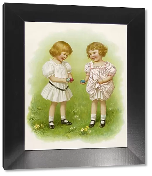 Two little girls with Easter eggs