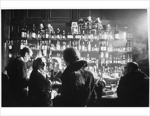 Barmaid in Smoky Pub