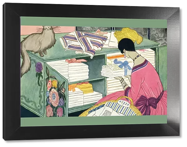 Woman at the linen cupboard (art deco)