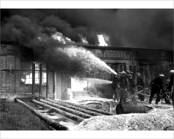 Foam applied at oil tank fire, Thames Haven, WW2