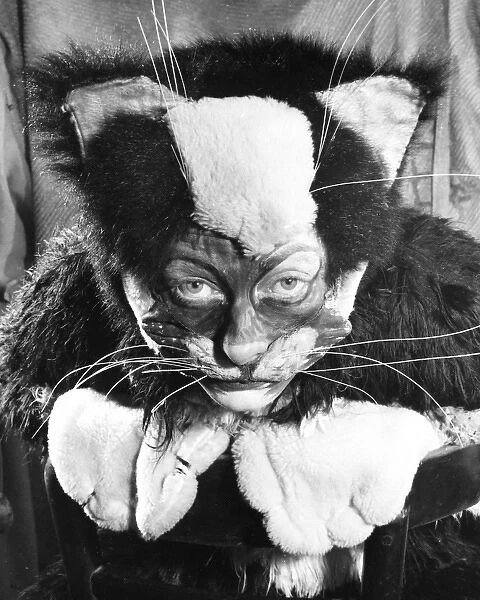 Actress Freda Wyn in cat costume for a pantomime