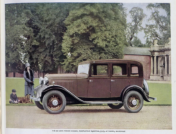 Advertisement for Ford Motor Company V8 car. Colour photograph showing woman, boy and dog, waiting by a brown V8 Deluxe Fordor Saloon, on gravel driveway outside a grand house. Captioned, Money is not everything