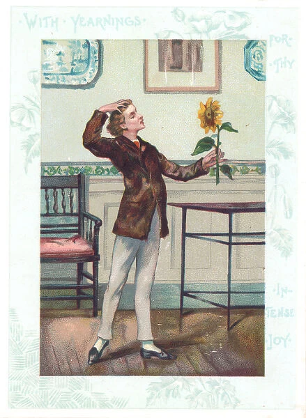 Aesthetic young man with sunflower