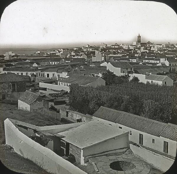 Alqesivas - Black and white view over town, church tower right background Date