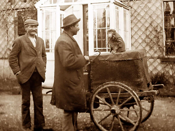 Barrel or street organ and monkey, early 1900s