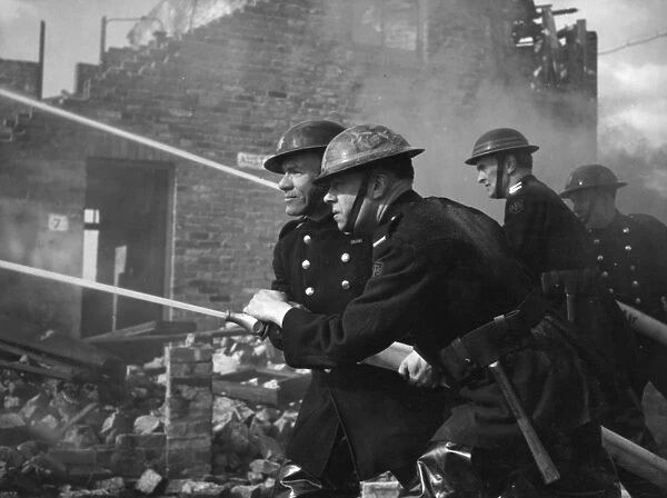 Blitz in London -- AFS firefighters at work, WW2