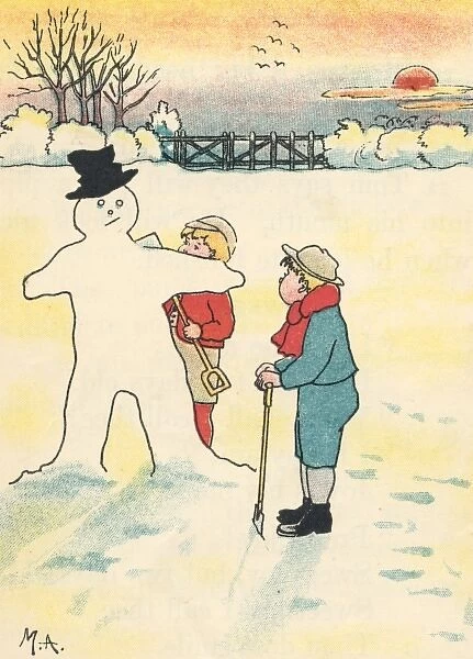 Two boys building a snowman