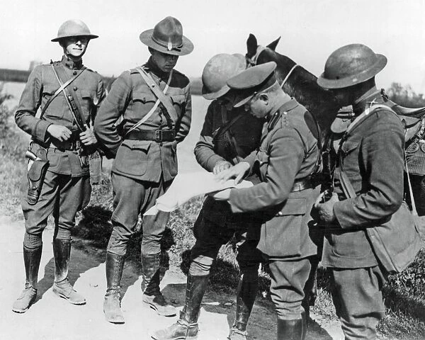 British and American soldiers with map, France, WW1
