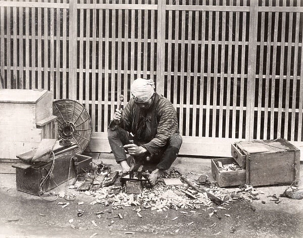 c. 1880s Japan - carpenter with tools at work