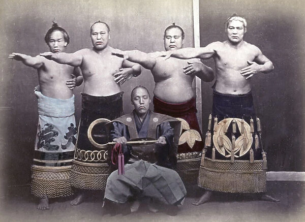c. 1880s Japan - sumo wrestlers and referee