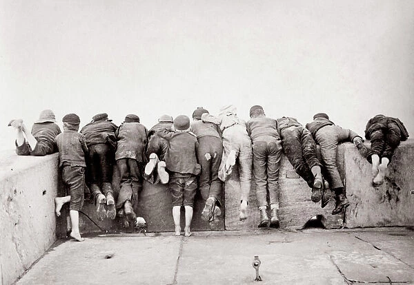 c. 1880s North East England - Whitby: boys leaning over harbour wall