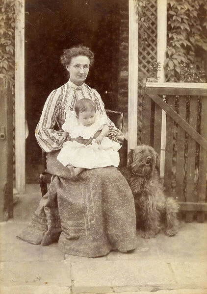 Cabinet photograph of a Mother with her young child and dog