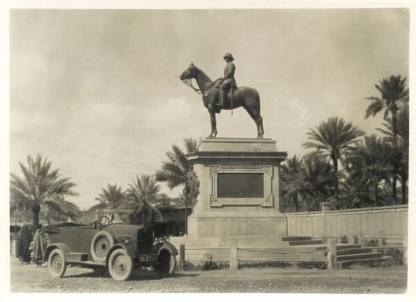 Car in front of equestrian statue, Middle East
