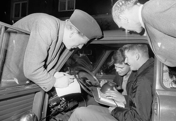 Car Rally. Studying the map in a car rally, Landskrona Motor Club, 1965. Date: 1965