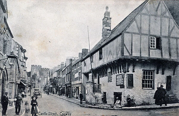 Castle Street, Conway, with timbered houses and castle