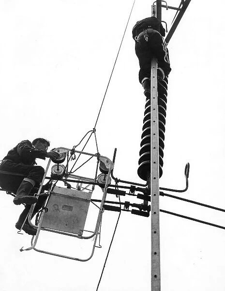 CEGB linesmen doing maintenance work, Kent