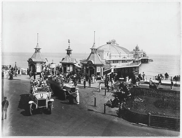 Charabancs near the pier at Eastbourne, East Sussex