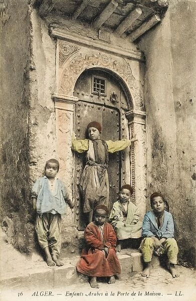Children by an ornate doorway