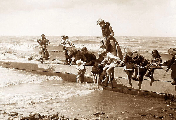 Children paddling at the seaside