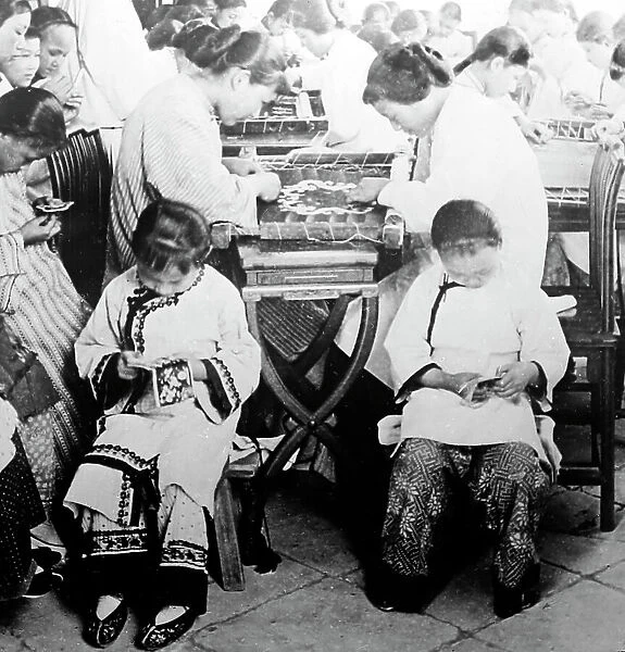Christian Mission children doing embroidery, China