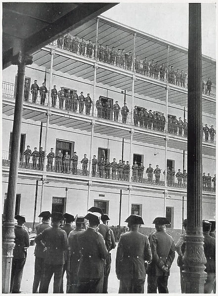 A Civil Guard Parade on a tiered building at their barracks, Spain, 1936. This was deemed a necessary alternative to drilling on the middle of the parade ground, under the burning sun of a summer's day