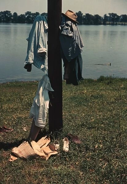 Clothes of swimmers hanging on a telegraph pole, Lake Provid