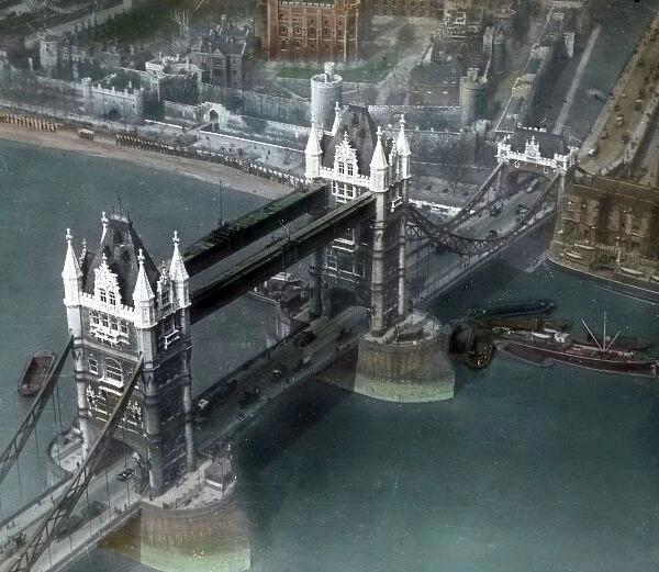 A coloured aerial view of Tower Bridge London looking south