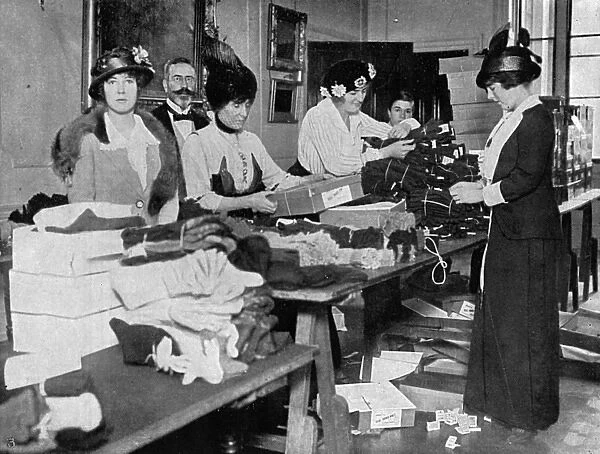 Countess Zia and Nada Torby packing mittens for troops, WW1