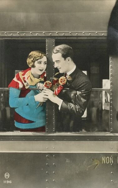 Couple in a railway carriage