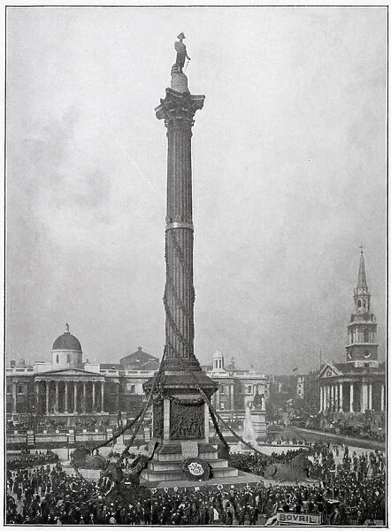 Crowds gather round Nelsons column in Trafalgar Square to celebrate the victory of